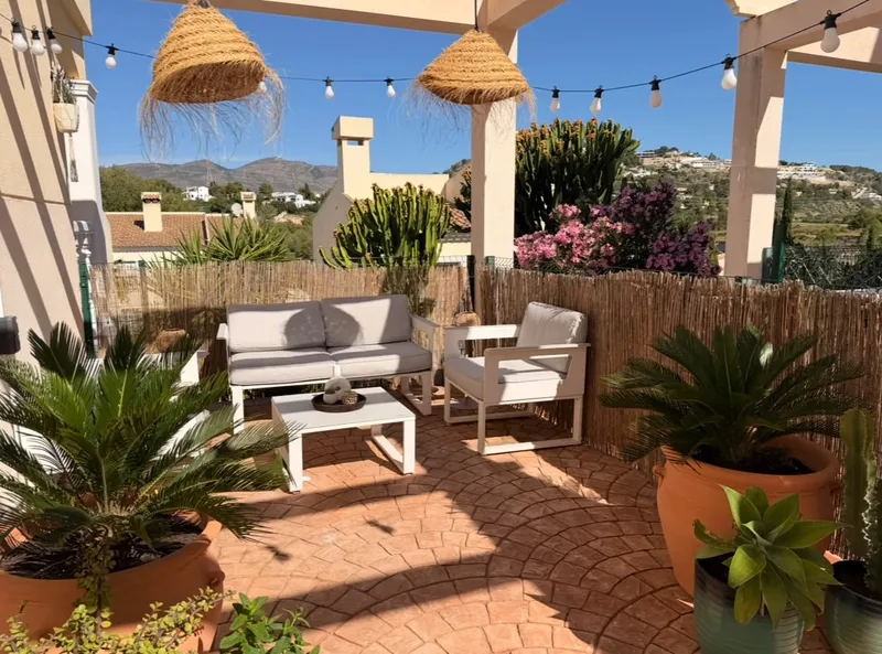 Zonnig dakterras met loungeset